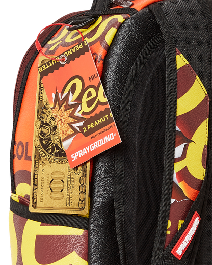 SPRAYGROUND® BACKPACK REESE'S SHARK BITE BACKPACK (DLXV)