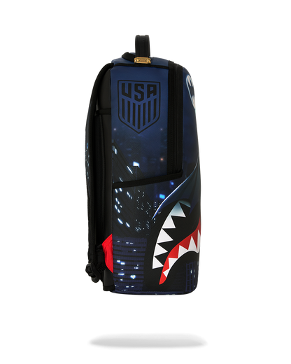 SPRAYGROUNDÂ® BACKPACK USSF x DC BATMAN OVER SHARKMOUTH BACKPACK
